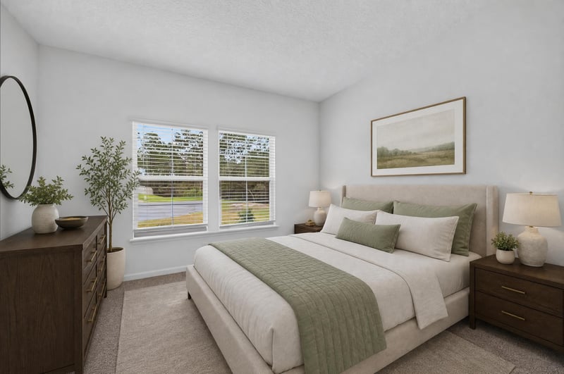 Bedroom with dresser and window, virtually staged at 9905 Ansley Lake Dr, Jacksonville, FL