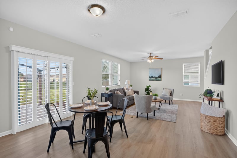 Living room with plantation shutters and wood floors at 6830 Hanford St, Jacksonville, FL 32219