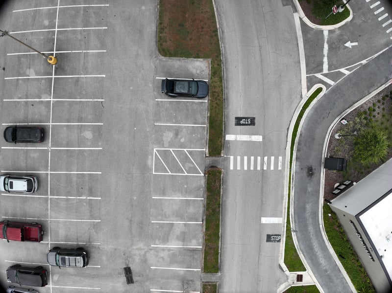 Aerial view of parking lot and crosswalk at 9406 Atlantic Blvd, Jacksonville, FL 32225