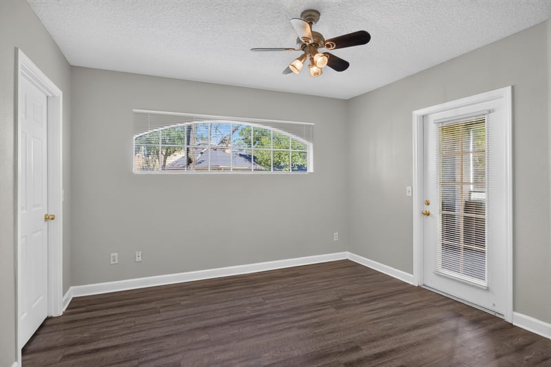 Room with arched window at 1701 The Greens Way 1415, Jacksonville Beach, FL 32250