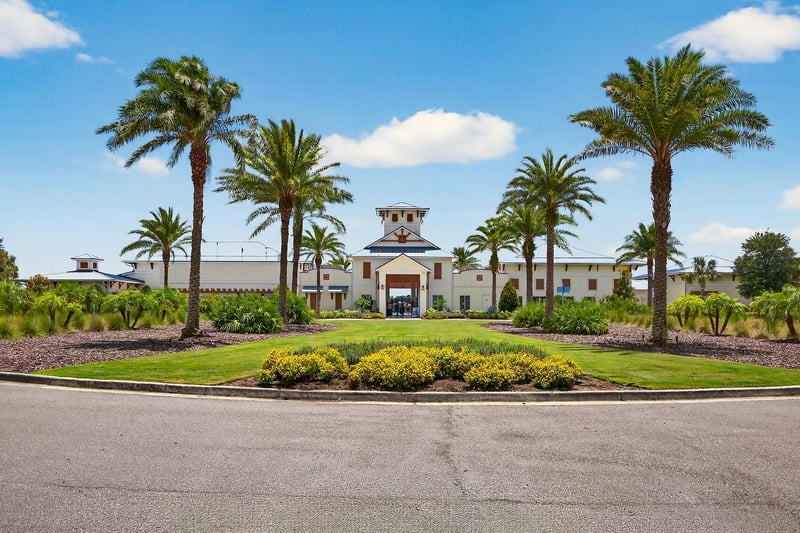 Amenity center entrance with palms in Beachwalk, St. Johns, FL