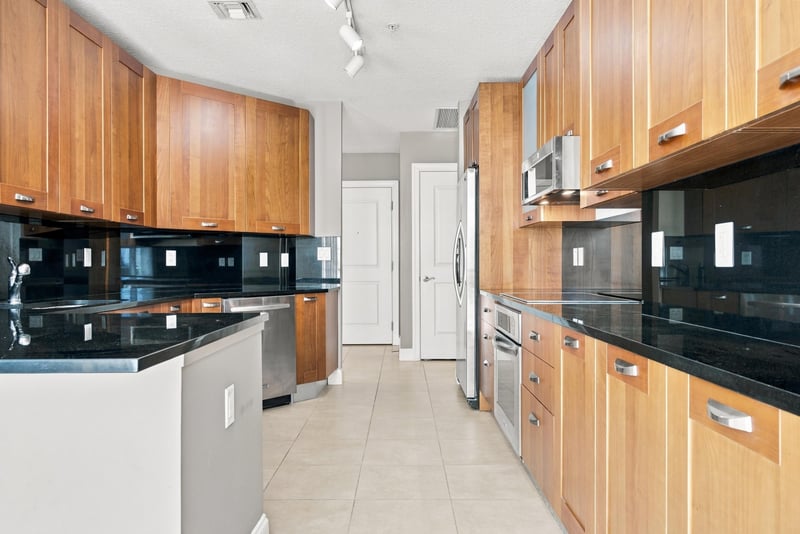 Kitchen with granite counters and island, photographed by Megapixeler on Riverplace Blvd, Jacksonville
