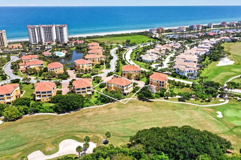 Aerial of golf course and community waterway in Palm Coast, FL