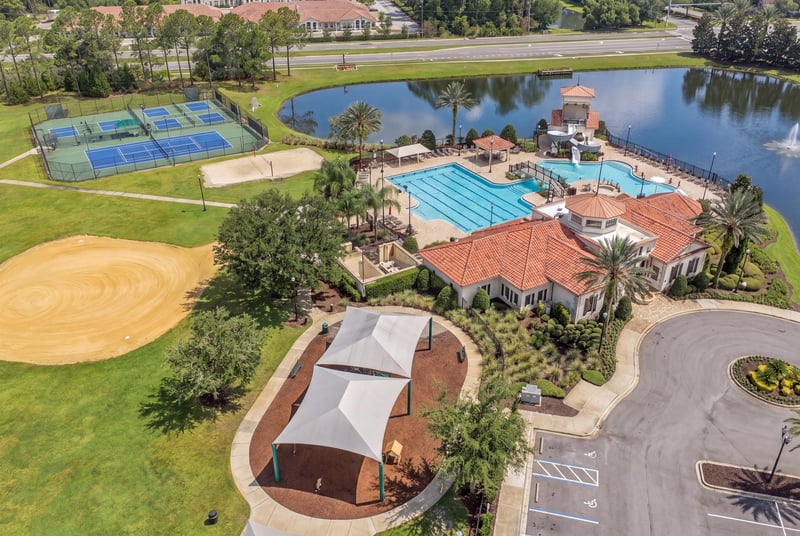 Aerial view of community pool and ball field in Murabella