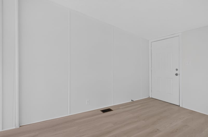 Hallway with vinyl floor leading to adjoining rooms at 55520 Jewel-Thomas Rd, Callahan, FL 32011