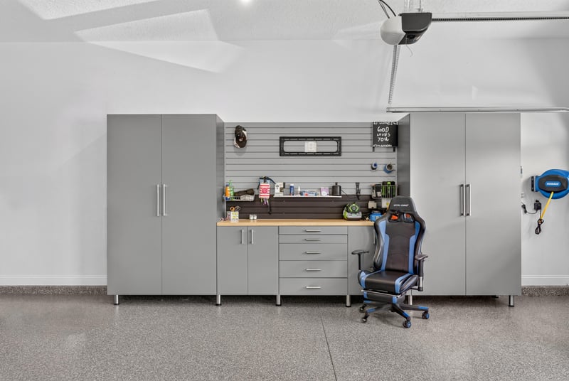 Garage cabinetry and workbench area at 785 Back Creek Dr, St. Augustine, FL 32092