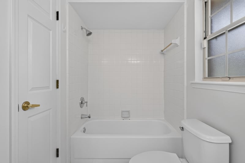 Bathroom tub and toilet at 12810 Swamp Owl Ln