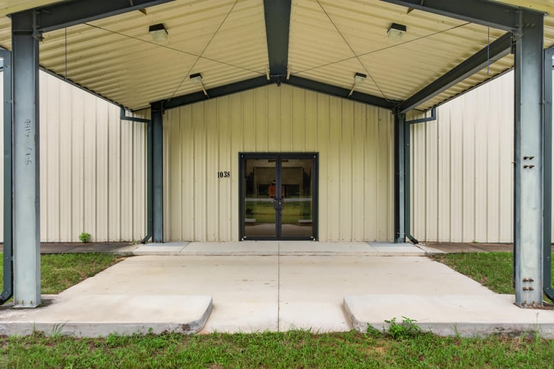 Covered entry with double glass doors at 1038 County Rd 315, Melrose