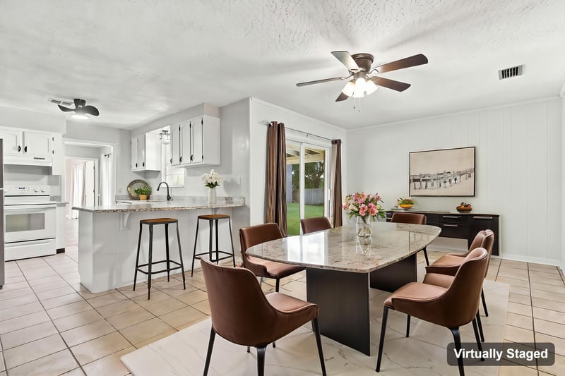 Virtually staged kitchen and dining area, photographed by Megapixeler on Crosby Ln, Orange Park