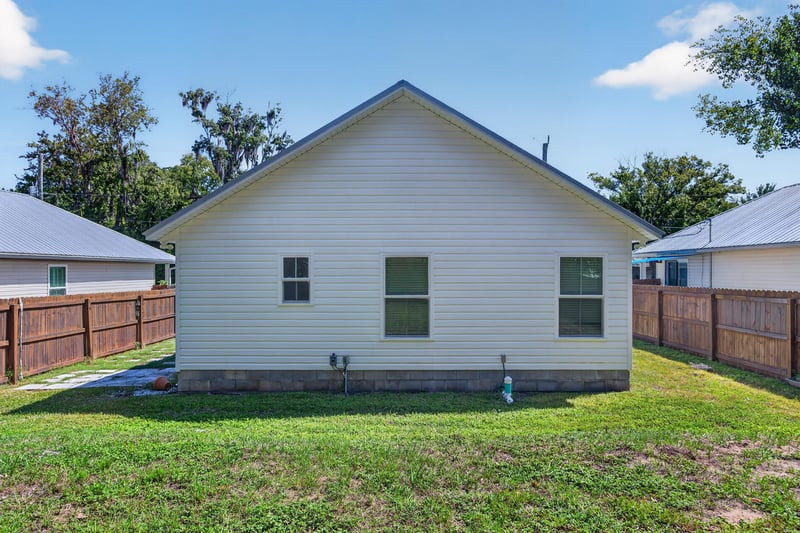 Side exterior corner of house with fencing at 2855 N 8th St, St. Augustine, FL 32084