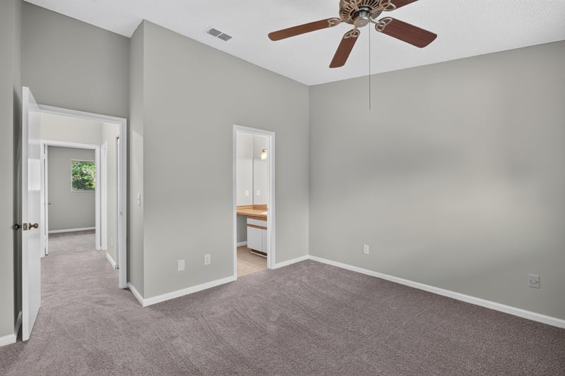 Upstairs hallway connecting bedrooms and bath at 3801 Crown Point Rd, Jacksonville, FL 32257
