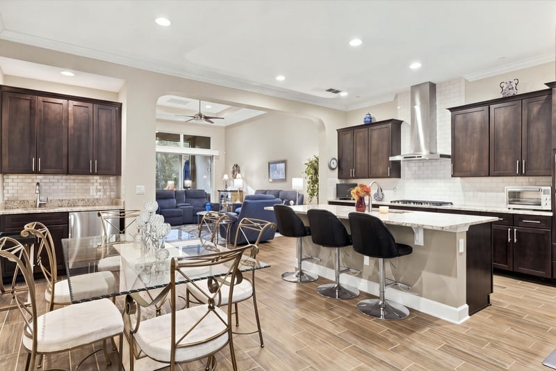 Open-concept kitchen and living area, photographed by Megapixeler on Lucena Ln, Jacksonville, FL