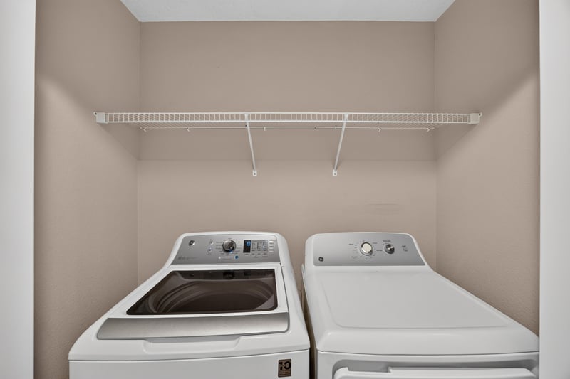 Laundry closet with washer and dryer at 3762 Hartsfield Forest Cir, Jacksonville, FL 32277