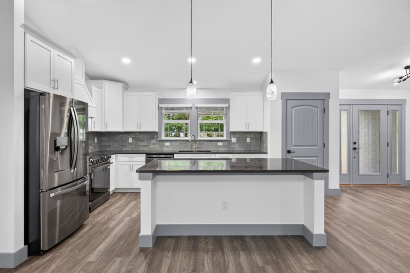 Kitchen island with pendant lighting at 4800 Acacia St, Middleburg, FL 32068
