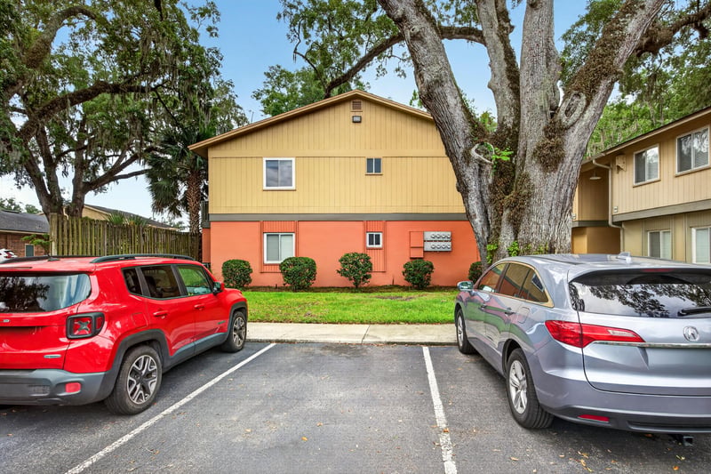 Parking area beside the condo building at 1800 Park Ave apt 358, Orange Park, FL