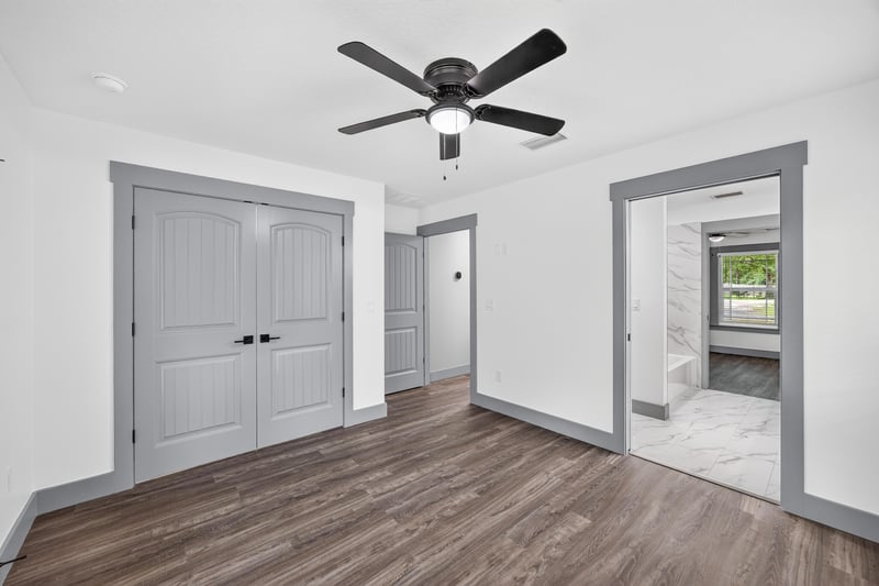 Bedroom with double closets, unfurnished at 4800 Acacia St, Middleburg, FL 32068