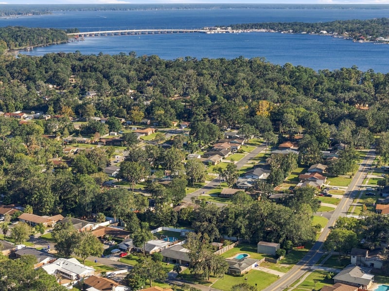Drone aerial view of the neighborhood toward the water, photographed by Megapixeler on Crosby Ln, Orange Park