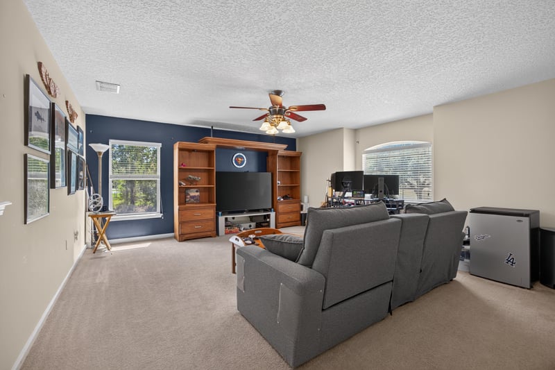 Bonus room with built-in media shelving at 3660 Middlebrook Dr, Orange Park, FL 32065