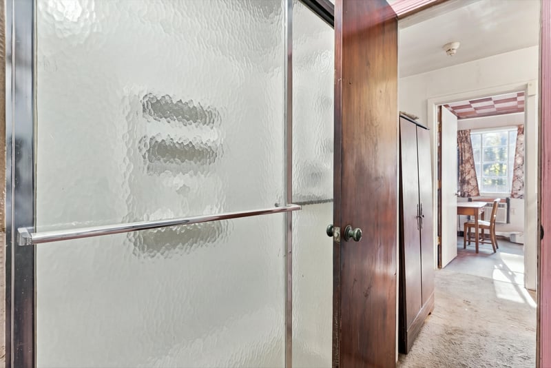 Shower with frosted glass sliding door at 1807 Idlewild Ave, Green Cove Springs, FL