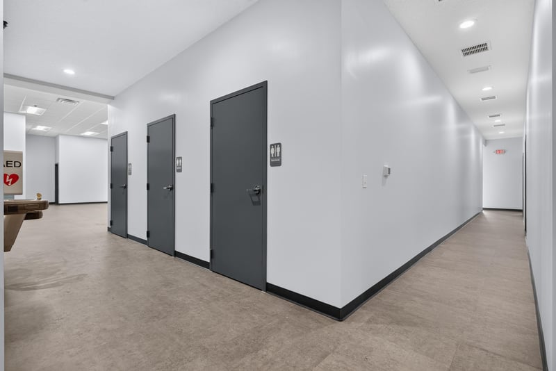 Hallway with multiple interior doors at 7240 Golden Wings Rd building 100, Jacksonville, FL 32244