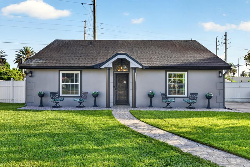 Front exterior full lawn view at 6931 Cane Grass Ln E, Jacksonville, FL 32244