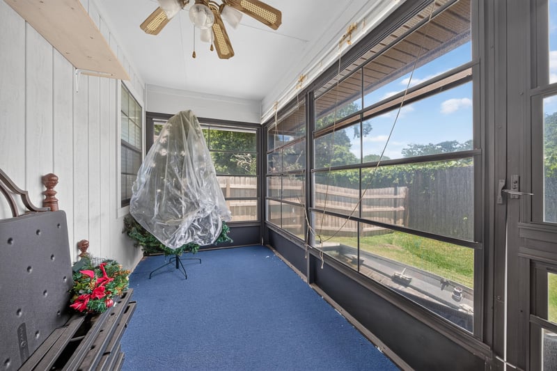 Empty screened porch with decorative netting at 2460 San Sago Ln, Jacksonville, FL