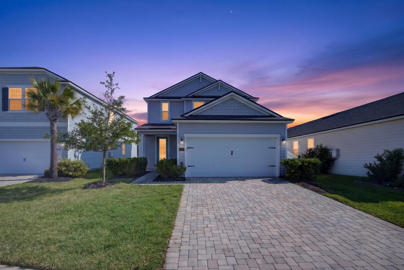 Front exterior at day-to-dusk at 331 Millerstone Dr, St. Augustine, FL 32092