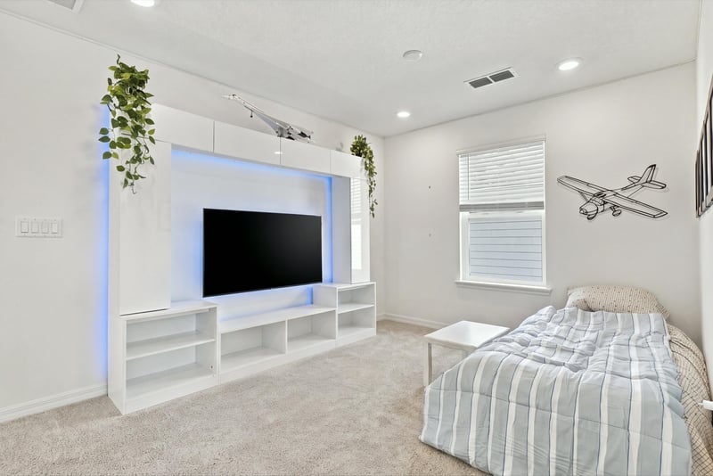 Bedroom with entertainment center, photographed by Megapixeler on Torres Trace, St. Augustine