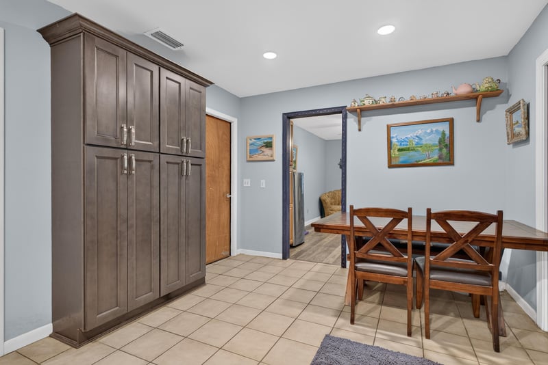 Dining area with wood table and tile floor at 3249 Maryland Ave, Green Cove Springs, FL