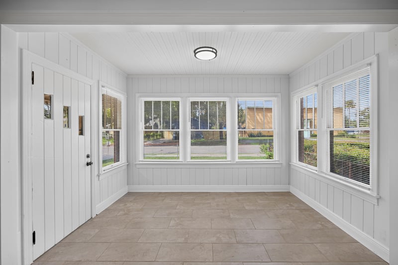 Sunroom with tile floor and wall of windows at 316 W 41st St, Jacksonville, FL 32206