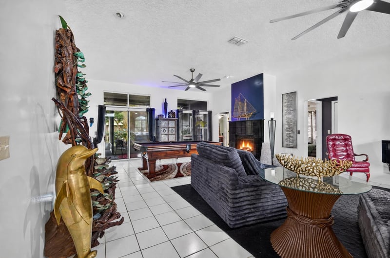 Living room with fireplace and sectional sofa at 1346 Gately Ct, Jacksonville, FL 32225