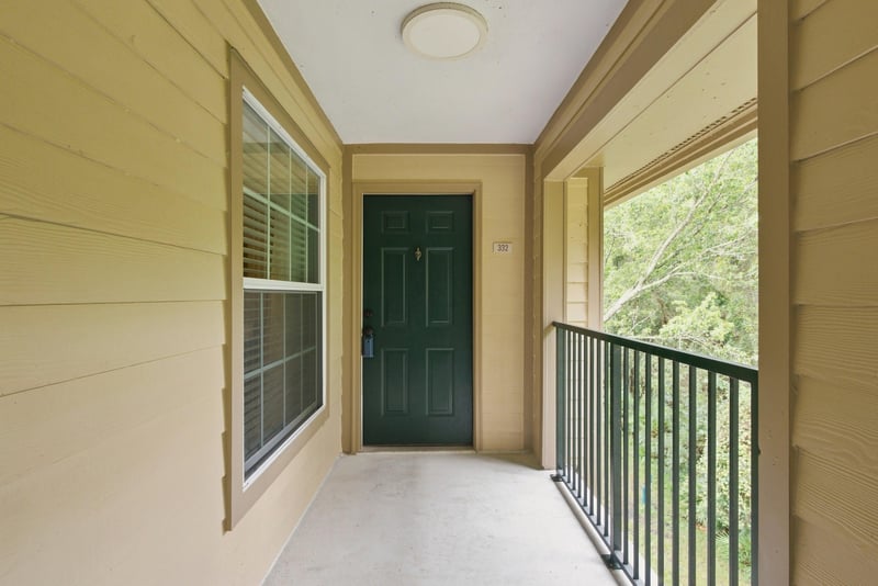 Covered breezeway leading to the front door at 7800 Point Meadows Dr, Jacksonville, FL 32256