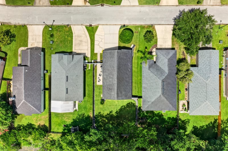 Drone view of neighborhood rooftops in Middleburg, FL