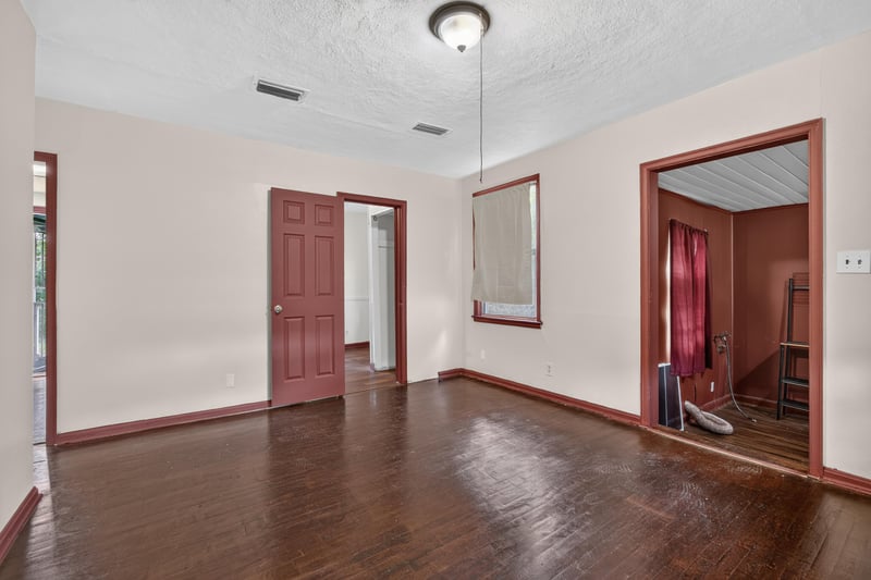 Entry hallway with red trim doors at 2132 Allandale Cir W, Jacksonville, FL