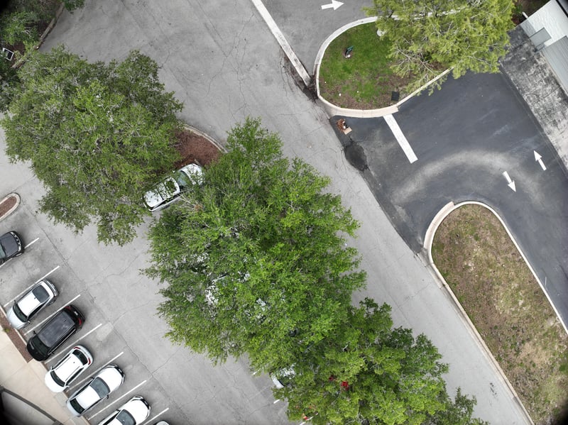 Aerial view of parking lot and landscaped median at 9406 Atlantic Blvd, Jacksonville, FL 32225