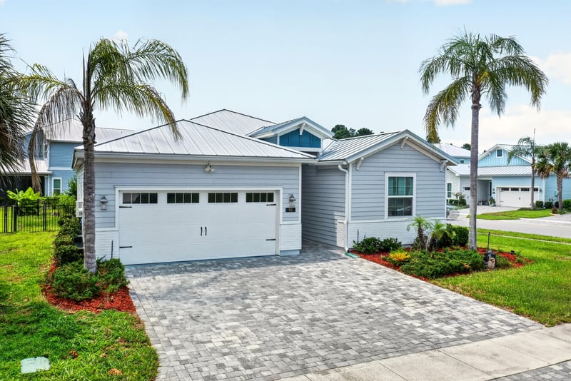 Two-car garage and paver driveway at 91 Tilloo Ct, St. Johns, FL