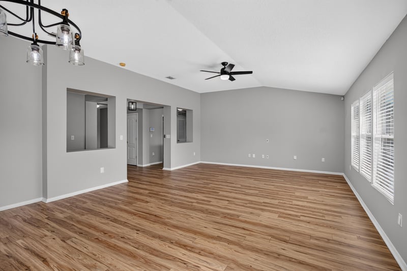 Great room with vaulted ceiling and windows at 7545 Lirope St, Jacksonville, FL 32244