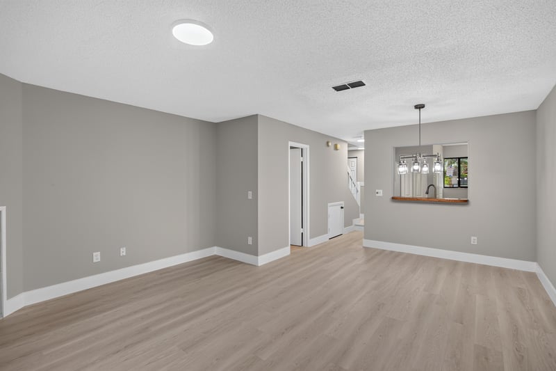 Open living space with view toward kitchen at 3801 Crown Point Rd, Jacksonville, FL 32257