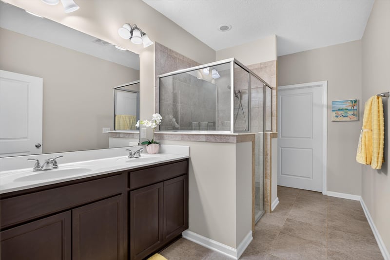 Bathroom with vanity and glass-enclosed shower at 2378 Caney Oaks Dr, Jacksonville, FL