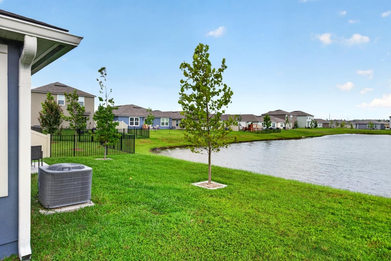 Pond view with patio furniture nearby in Jacksonville, FL
