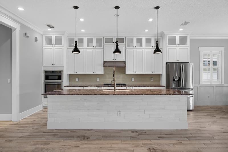 Wide kitchen view with glass-front upper cabinets at 186 Freshwater Dr