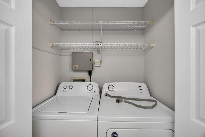 Laundry closet with washer and dryer at 3801 Crown Point Rd, Jacksonville, FL 32257