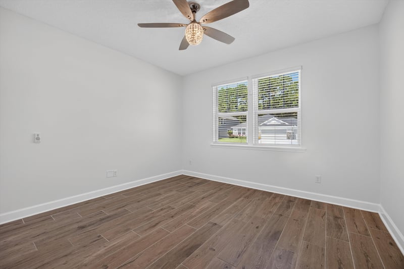 Bedroom with window at 855 Flach Dr, St. Johns, FL