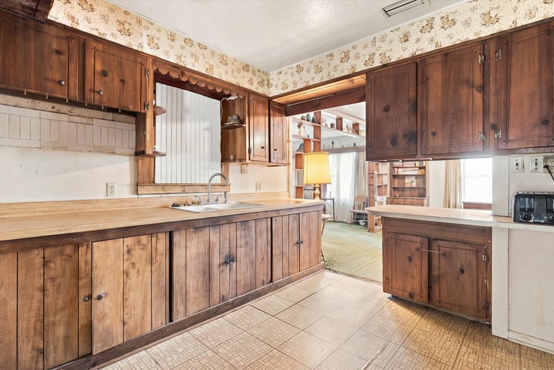 Kitchen with wood cabinets and tile counters at 1807 Idlewild Ave, Green Cove Springs, FL