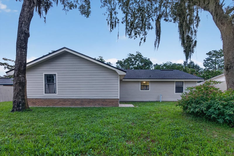 Side exterior at day-to-dusk with siding at 12344 Cormorant Ct, Jacksonville, FL