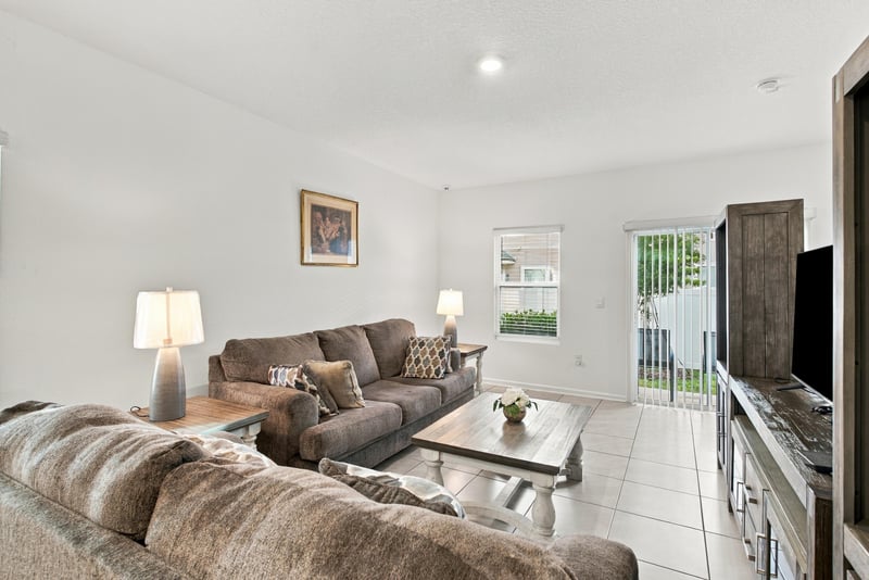 Living room with sofa and TV, photographed by Megapixeler on Haymon Ave, Jacksonville