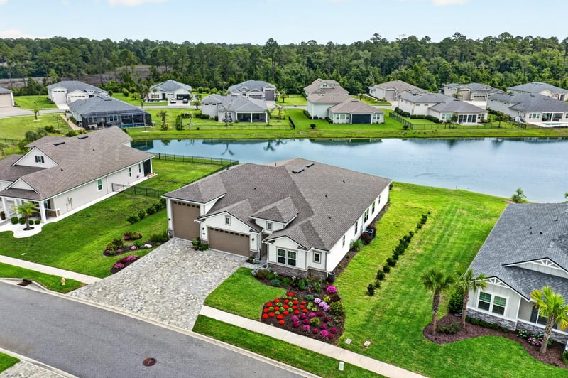 Drone view of the home beside a pond in Fernandina Beach, FL