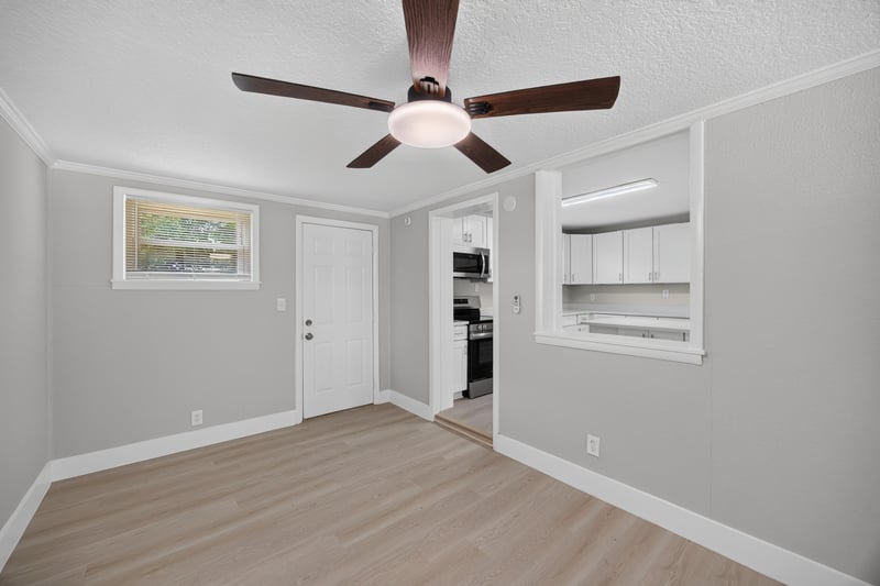 Hallway with ceiling fan leading to bedrooms at 6238 Randia Dr, Jacksonville, FL 32210