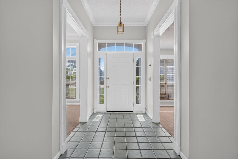 Foyer with glass sidelights and tile floor at 400 Ashcroft Landing Dr, Jacksonville, FL 32225