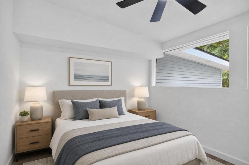 Staged bedroom with bed and window light at 3113 Kline Rd, Jacksonville, FL 32246